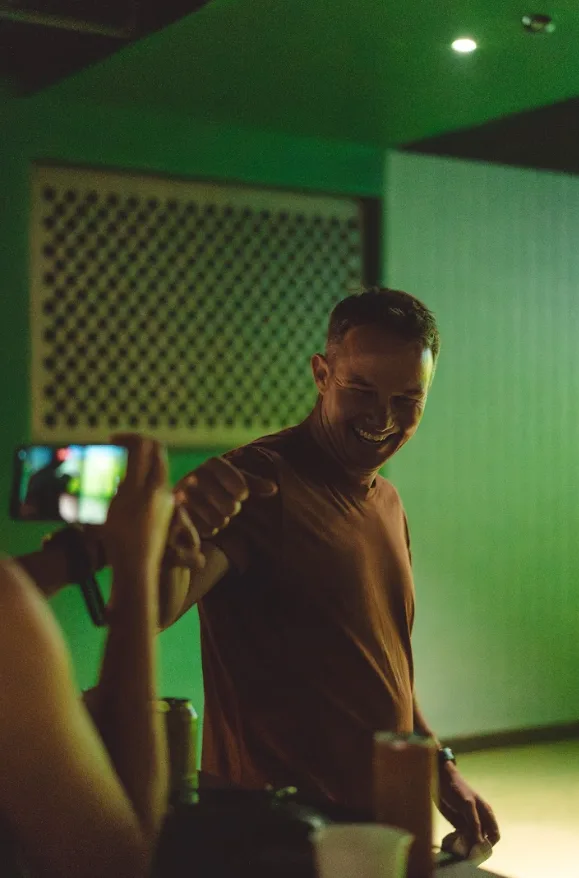 Members fist bumping in the club